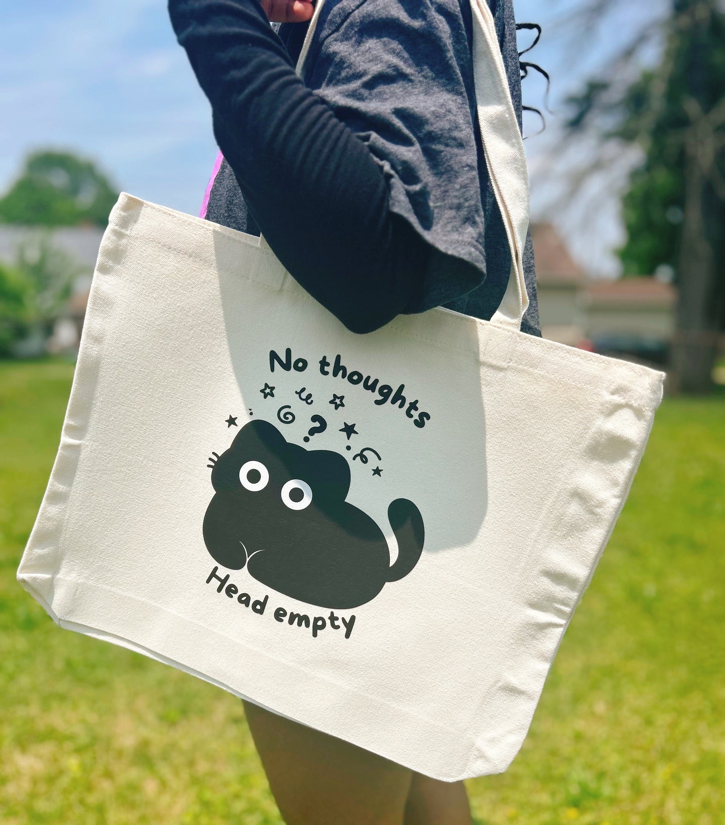 "No thoughts, Head empty" daily tote bag